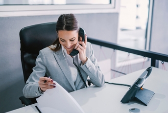 an assistant schedules a meeting