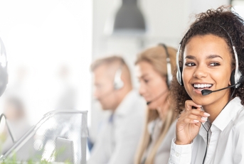 Call center worker accompanied by her team