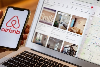 smartphone with airbnb application
