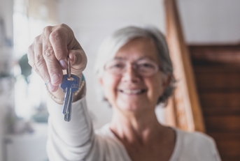 landlord holding a key