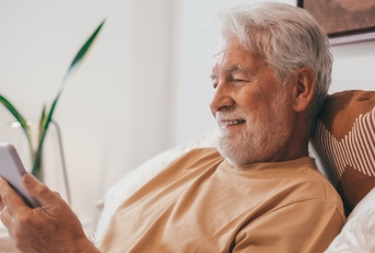 Older man using phone