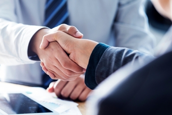 business handshake in the office