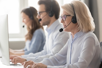call center employee sitting at workplace