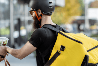 food delivery worker completing delivery