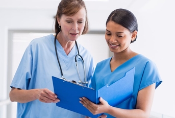 nurse and doctor discussing