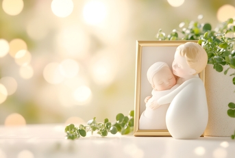figurine of a mother holding her baby