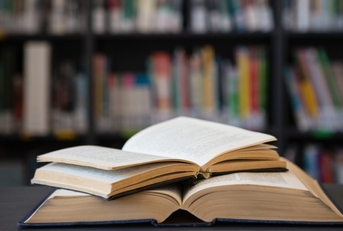 Close up of open books on table