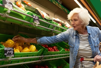 Senior woman grocery shopping