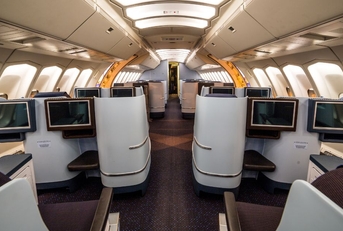 view of business class seating on an airplane