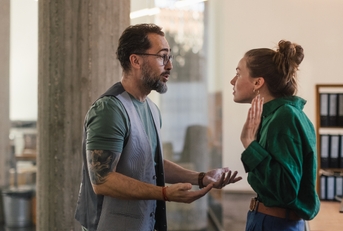 colleagues arguing in office