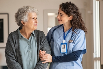 caregiver assist senior woman