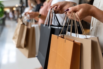 showcasing designer shopping bags 