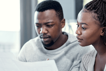 Couple looking at bank statements