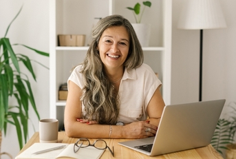 Woman smiling working from home