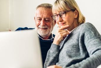 senior couple reading documents