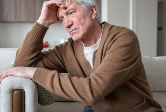 old man with Alzheimer sitting abandoned