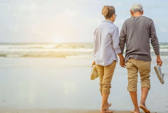 retired senior couple at the beach