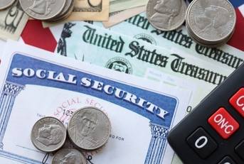 social security card assorted cash and government checks