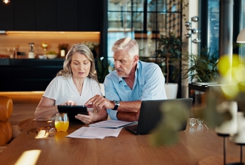 couple reviewing financial documents