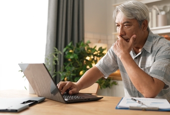 business man working and using computer