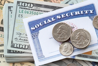 American US dollars money bills and US social security number card