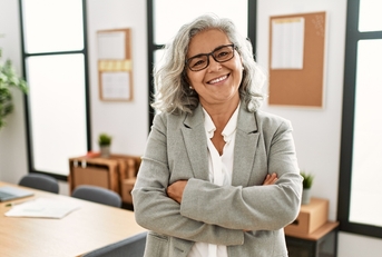 Woman smiling with arms crossed 