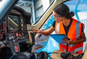 Tech woman inspecting transportation