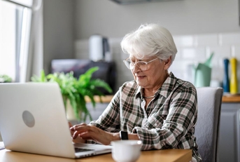 older woman on laptop