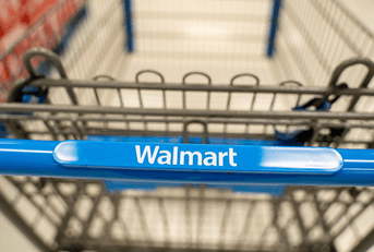 Close up of Walmart shopping cart handle inside store