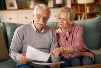 older couple reviewing papers