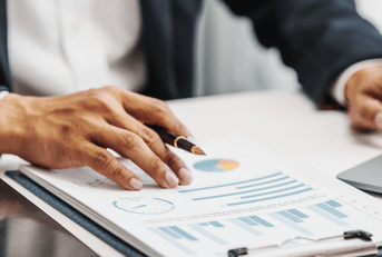 Man looking at investing trends