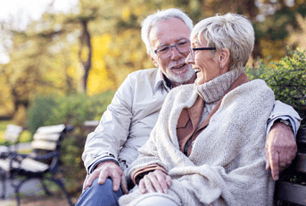 Older couple sitting on bench