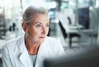 Older woman working in a lab