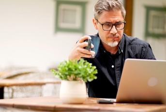 middle aged man on laptop