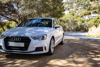 luxury white car parked
