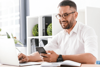 Young man reviewing investing apps