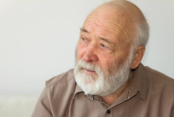 Portrait of senior man looking pensive