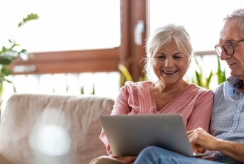 Retired couple on laptop