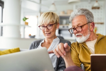 Retired couple on laptop