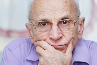 Senior man looking concerned