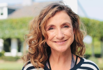 Portrait of a woman in her 60s outdoors 