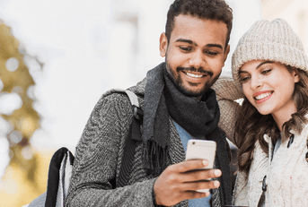 Couple looking at phone