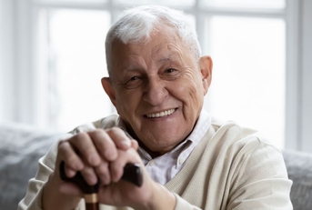Portrait of a smiling man in his 80s