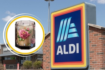 Aldi store sign with floral glass candle