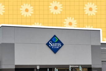 Sam's Club storefront with a spring background