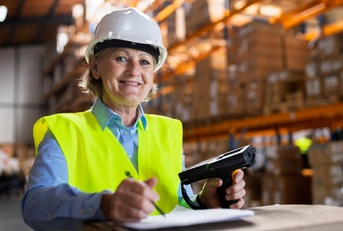 Older woman working in warehouse