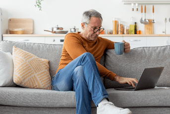 Older man checking statement online