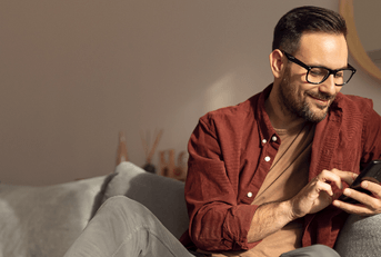 Man on phone at home