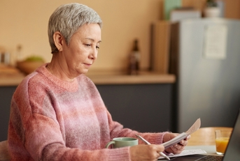 Senior woman reviewing paperwork