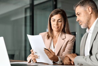Woman banking with advisor